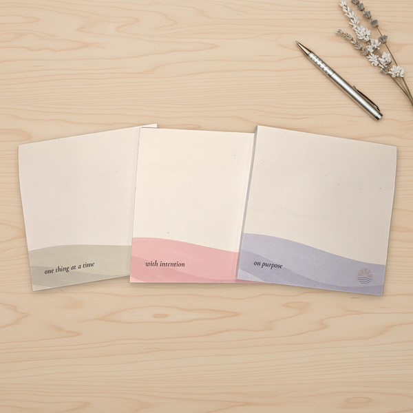 three post its with motivational sayings on a white background.